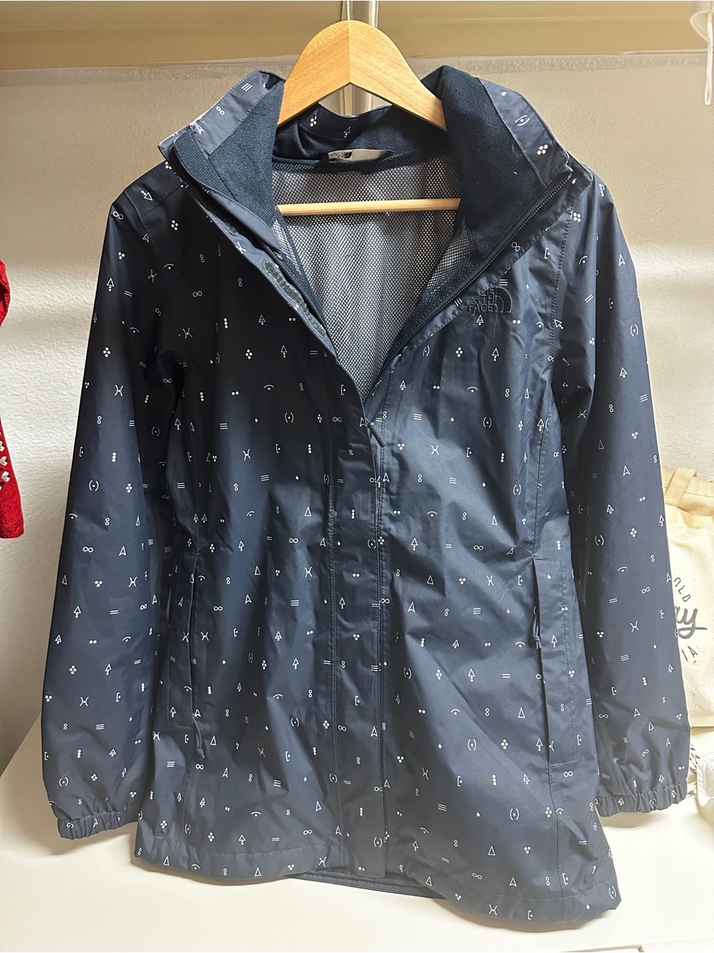 The North Face Navy Raincoat with Micro Geometric Print
